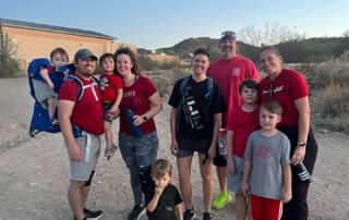 A group of people standing next to each other.