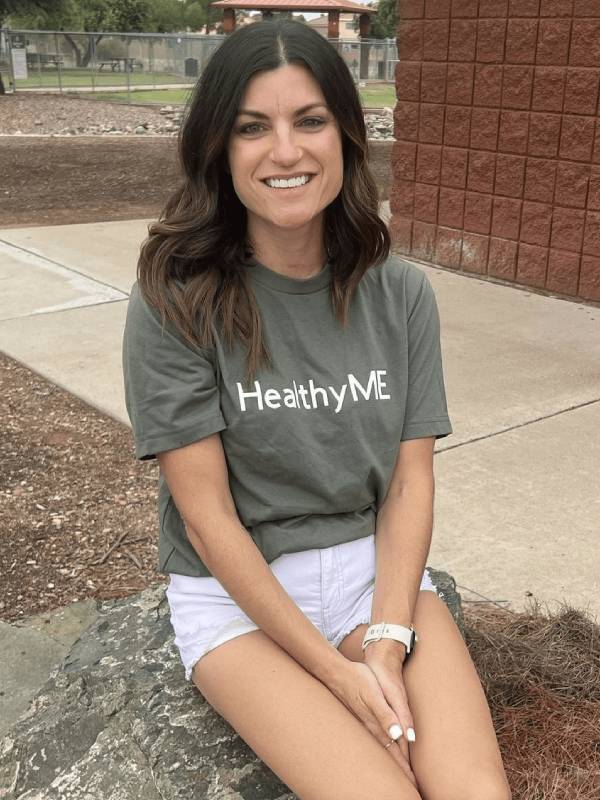 Woman wearing a "Healthy ME" shirt.